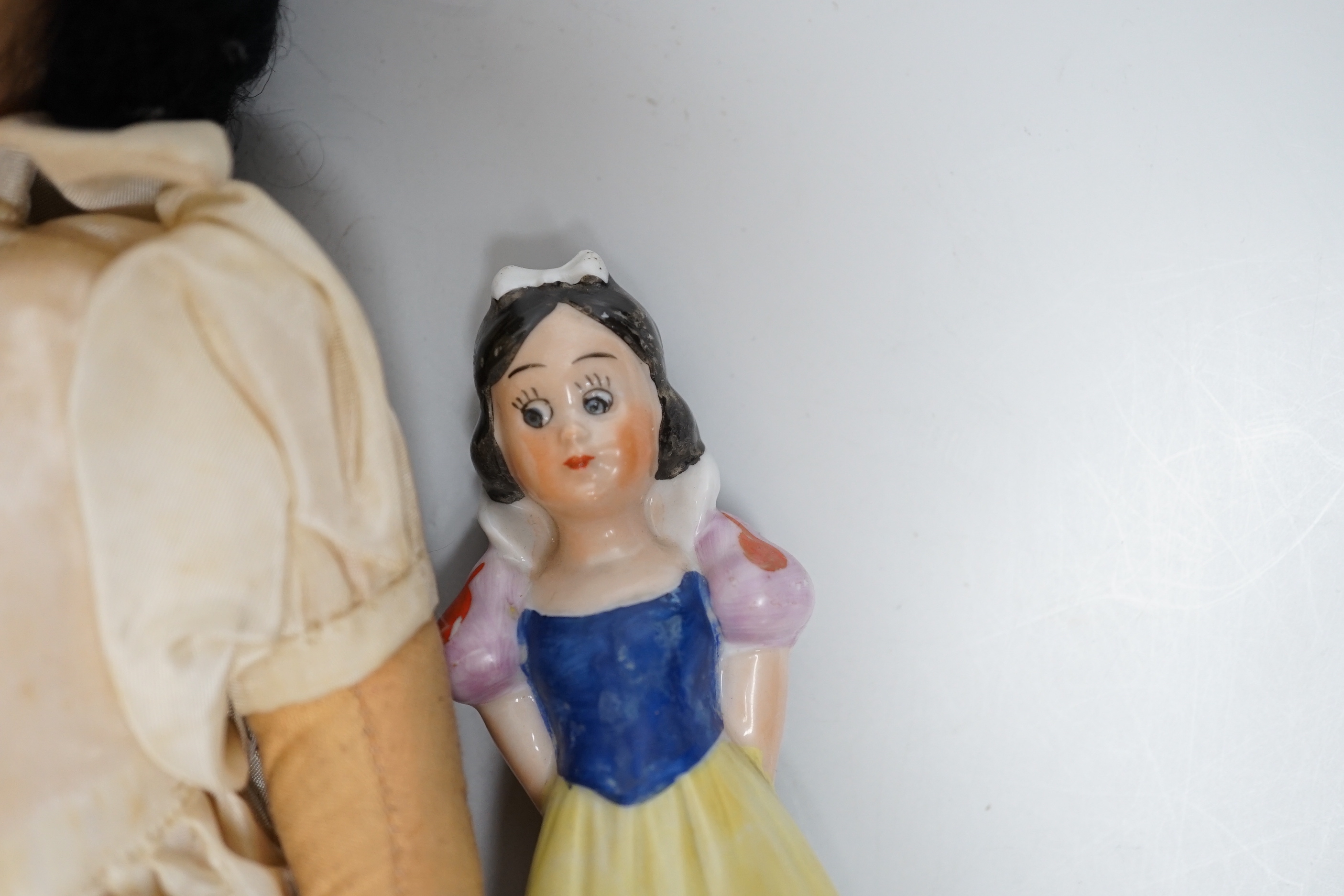 Chad Valley Princess Margaret and Snow White felt dolls and a porcelain figure of Snow White, tallest 45cm high (3)